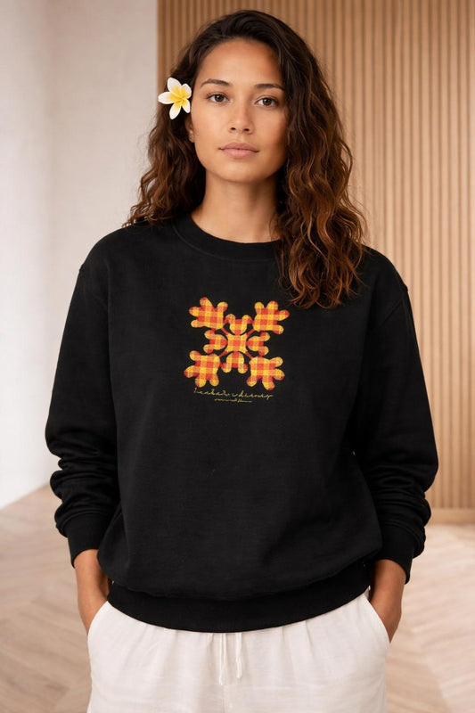 Close-up of the model wearing Huaka'i i Disney Crewneck Sweater