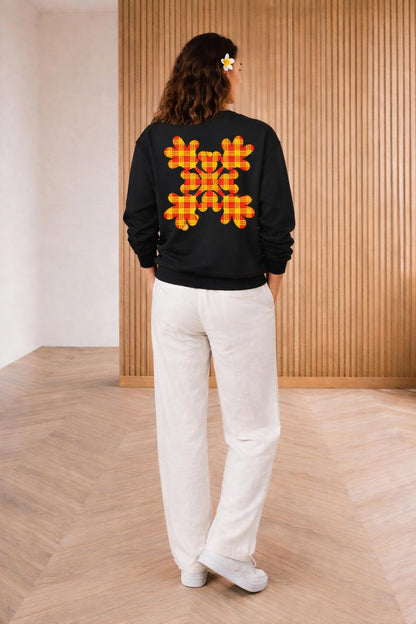 Back pose of the model wearing Huaka'i i Disney Crewneck Sweater