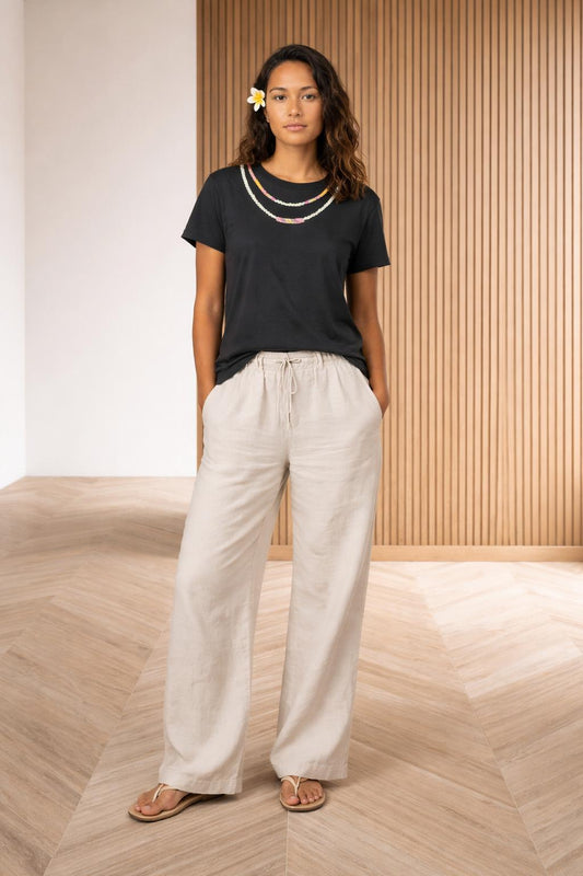 Full body view of the model wearing Ni'ihau Shell Lei Tshirt