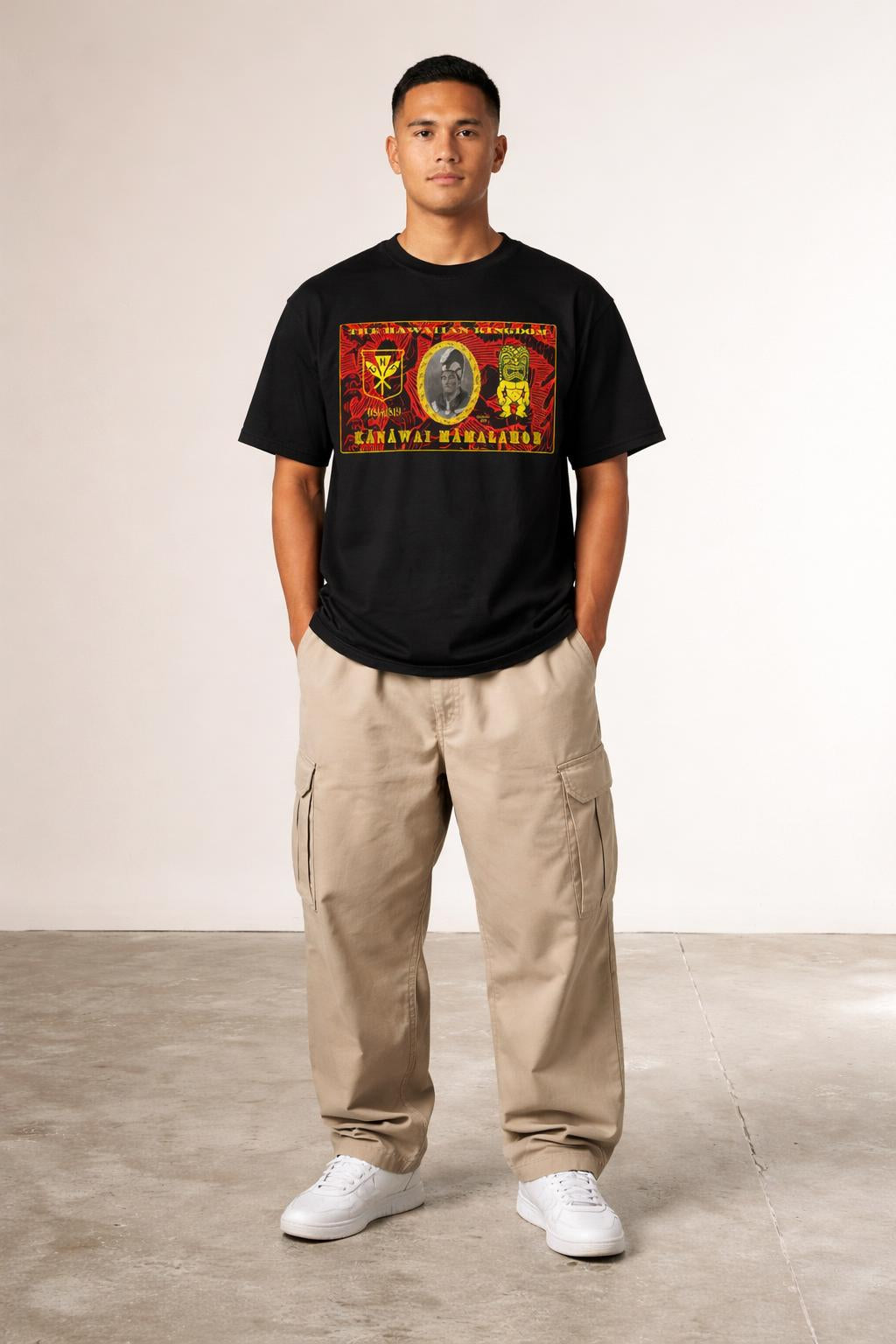 Full body view of the model wearing King Kamehameha Kanaka Kala T-Shirt