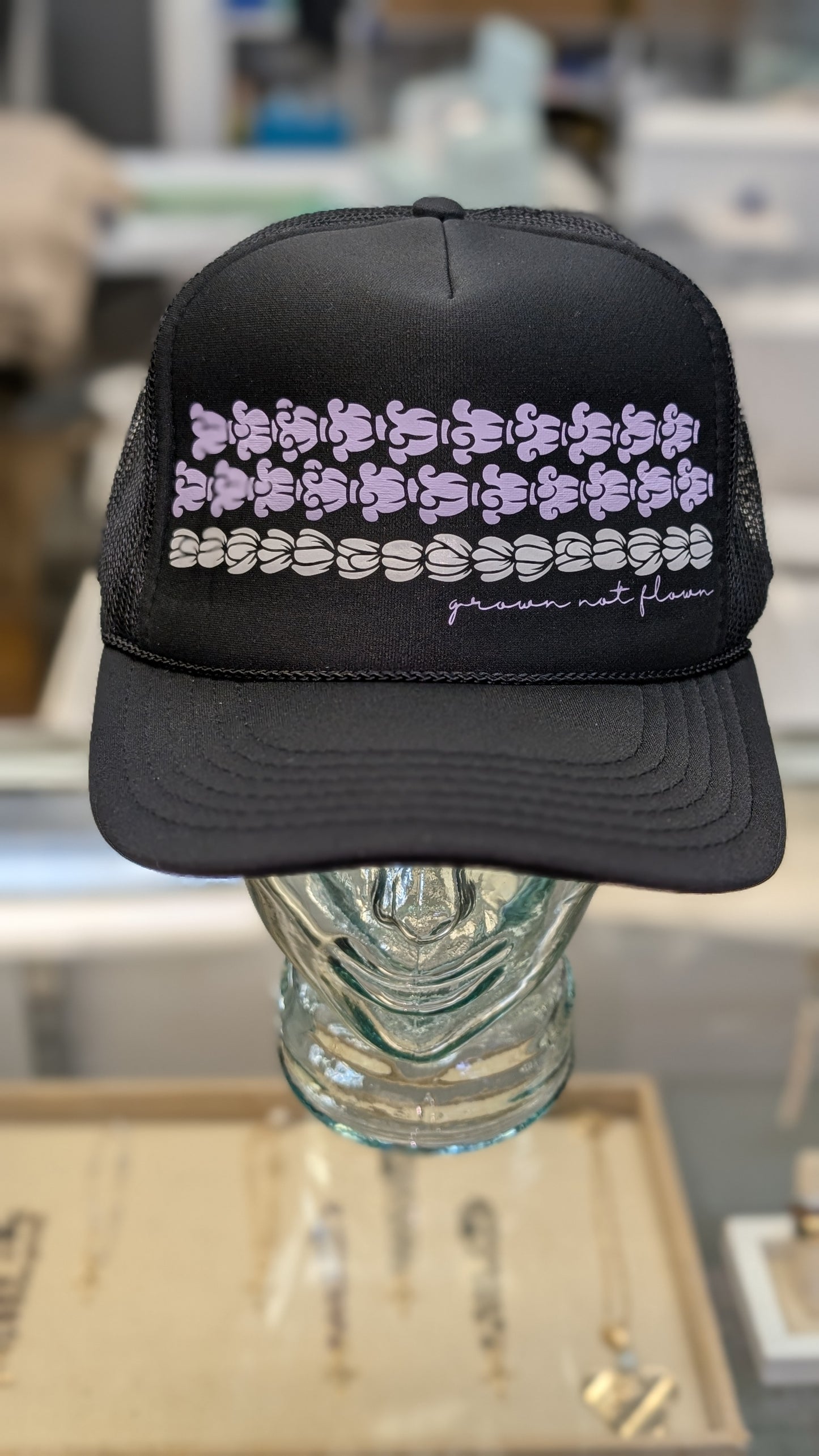 Crown Flower and Pikake Trucker Hat
